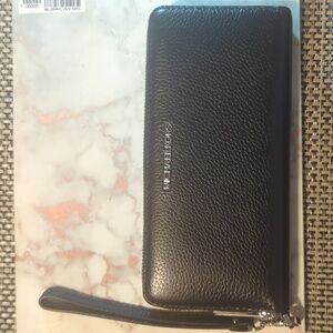 LG trvl continental leather